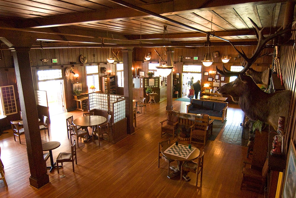 the hotel dining area with an elk head hung on the wall