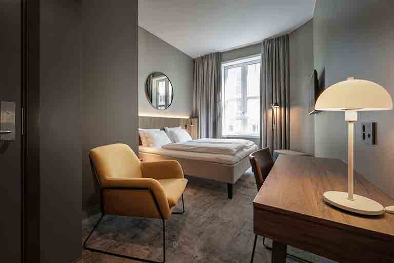 Guest bedroom at Karl Johan Hotel in Norway