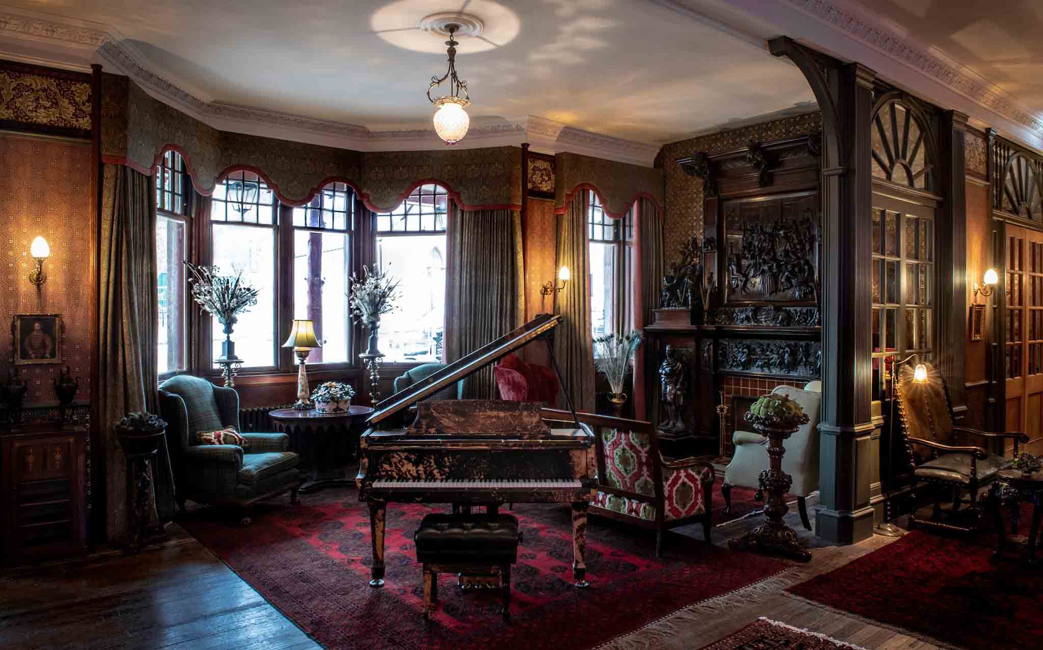 Lounge with piano at The Fife Arms hotel in Scotland