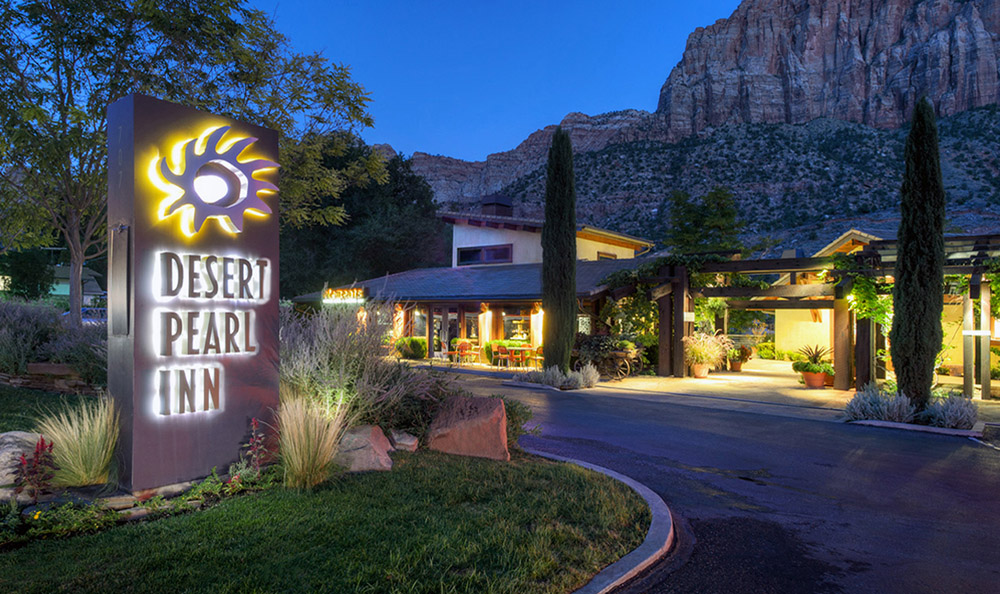 desert pearl inn exterior at dusk