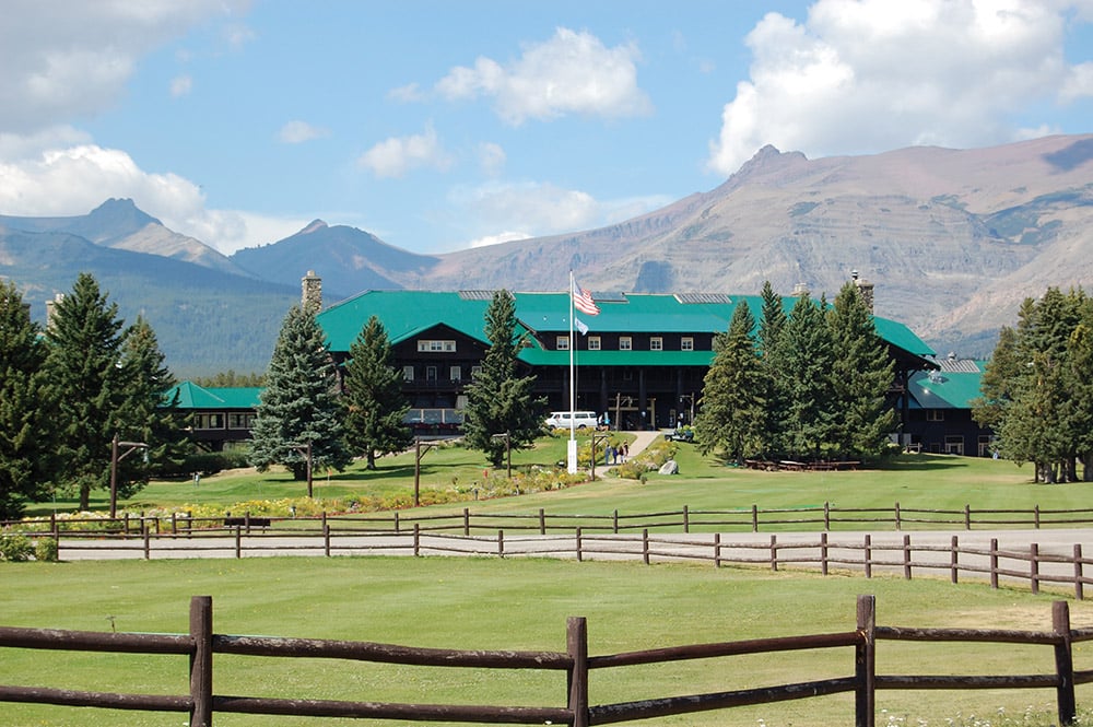 looking across the lawn to the exterior of Glacier Park Lodge