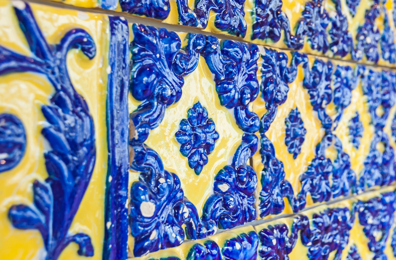 Closeup of yellow and blue ornate walls in Portugal