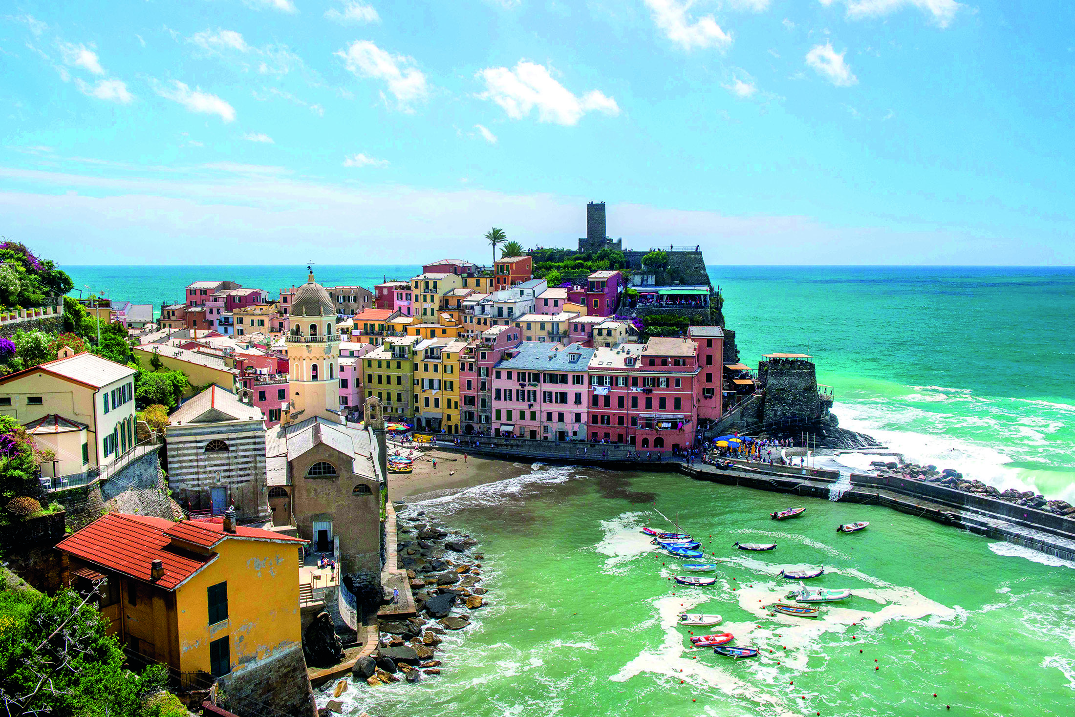 Colorful homes next to the water in Italy