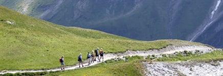 hikers among mountains